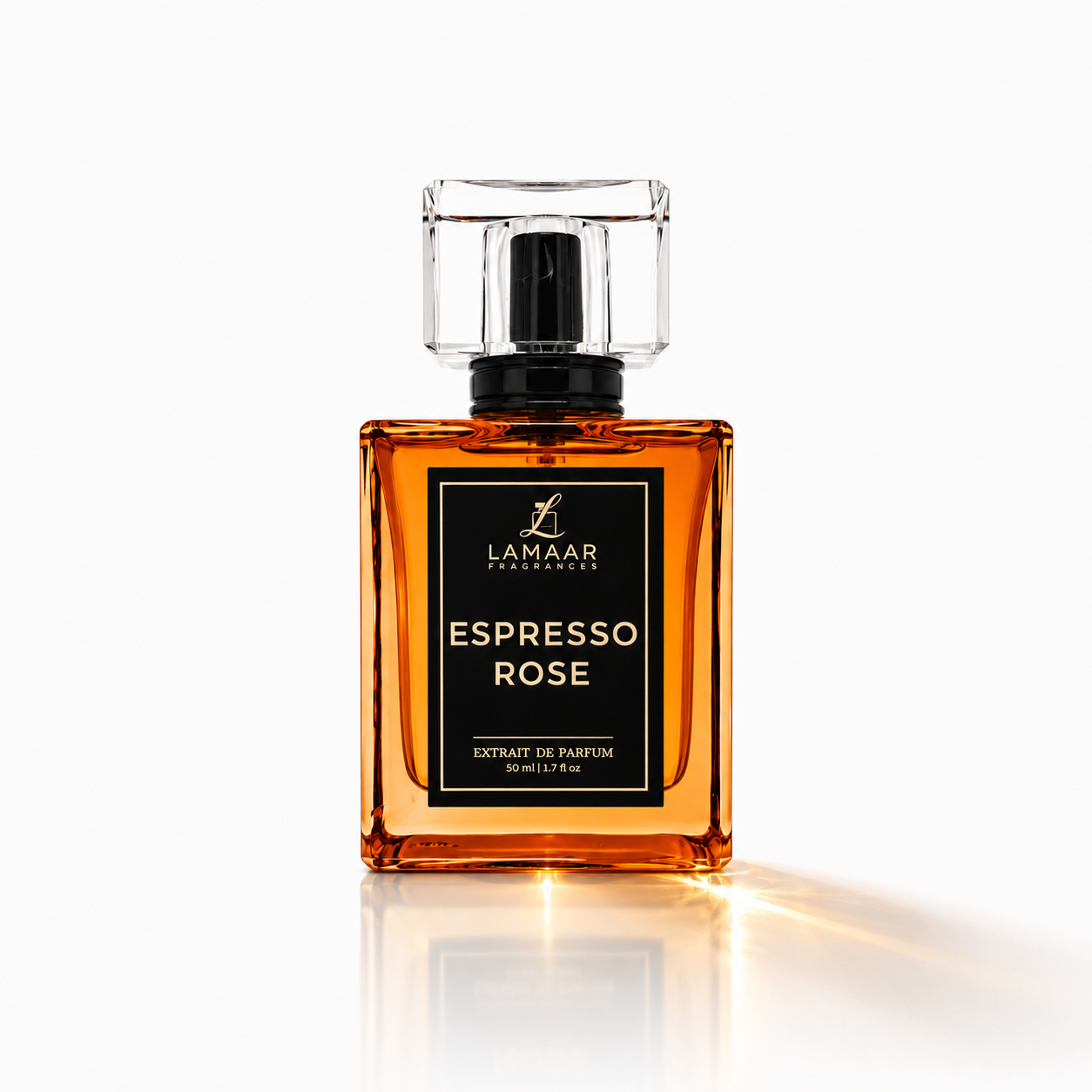 A rectangular amber glass perfume bottle with a black label reading 'LAMAAR LONDON ESPRESSO ROSE' and a clear cap, centered on a white background with a soft reflection below.